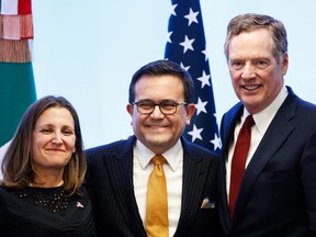 Canadian Foreign Affairs Minister Chrystia Freeland, left, Mexico's Secretary of Economy Ildefonso Guajardo Villarreal, centre, and U.S. Trade Representative Robert Lighthizer.