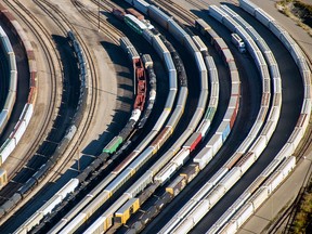 Freight trains and oil tankers sit in a Toronto rail yard.