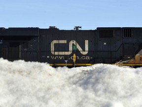 A Canadian National (CN) Rail train sits in the railyard near Resources Road and 88 Avenue Monday, Feb. 23, 2015 in Grande Prairie, Alta. CN Rail and the union representing its workers moved to resume contract talks Monday, and have so far averted a potential strike.