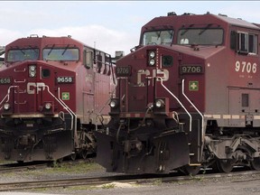Canadian Pacific Railway locomotives sit in a rail yard.