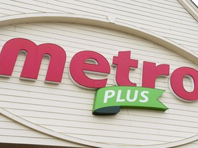 A Metro supermarket is seen in Ste. Marthe-sur-le-Lac, Que., on September 27, 2017. Metro Inc. earned $106.9 million in its latest quarter, down from $132.4 million a year ago. The grocer says the profit amounted to 47 cents per diluted share for the 12-weeks ended March 17 compared with 56 cents per diluted share in the same quarter last year.