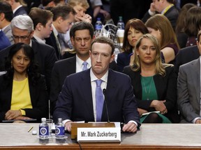 Facebook CEO Mark Zuckerberg testifies before a joint hearing of the Commerce and Judiciary Committees on Capitol Hill in Washington, Tuesday, April 10, 2018, about the use of Facebook data to target American voters in the 2016 election.