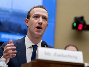 Facebook CEO Mark Zuckerberg testifies before a House Energy and Commerce hearing on Capitol Hill in Washington, Wednesday, April 11, 2018, about the use of Facebook data to target American voters in the 2016 election and data privacy.