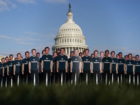 Life-sized cutouts depicting Facebook CEO Mark Zuckerberg wearing "Fix Fakebook" T-shirts are displayed by advocacy group, Avaaz, on the South East Lawn of the Capitol on Capitol Hill in Washington, Tuesday, April 10, 2018, ahead of Zuckerberg's appearance before a Senate Judiciary and Commerce Committees joint hearing.