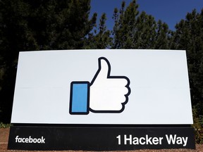 The Facebook logo at the company's headquarters in Menlo Park, Calif.