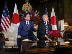 President Donald Trump listens as Japanese Prime Minister Shinzo Abe speaks during their meeting at Trump's private Mar-a-Lago club, Tuesday, April 17, 2018, in Palm Beach, Fla.