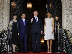 President Donald Trump and first lady Melania Trump host Japanese Prime Minister Shinzo Abe and his wife Akie Abe, for dinner at Trump's private Mar-a-Lago club, Wednesday, April 18, 2018, in Palm Beach, Fla.