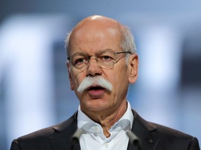 FILE - in This April 5, 2018 file photo Dieter Zetsche, CEO of the Daimler AG, speaks during the annual shareholders' meeting of the car maker in Berlin. Daimler AG, maker of Mercedes-Benz luxury cars, saw its first-quarter net profit fall 11 percent from the same quarter a year ago, when the company had one-time gains from the sale of real estate and from financial factors.