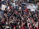 Thousands of people march together during a protest against the Kinder Morgan Trans Mountain pipeline expansion in Burnaby, B.C., on March 10.