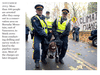 RCMP officers take protesters into custody at a Trans Mountain demonstration in Burnaby, B.C., on Nov. 20, 2014.