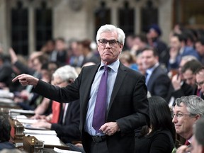 Minister of Natural Resources Jim Carr rises during Question Period in the House of Commons on Parliament Hill in Ottawa on Wednesday, April 18, 2018.