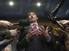 Prime Minister Justin Trudeau responds to reporters questions after speaking at the GBC Resource Efficiency Workshop B7, as part of the G7 meeting, Thursday, April 5, 2018 in Quebec City.
