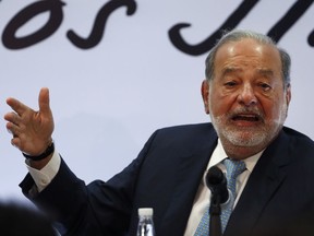 Mexican billionaire Carlos Slim gives a press conference in Mexico City, Monday, April 16, 2018. Slim says he would be concerned if leftist presidential candidate Andres Manuel Lopez Obrador wins on July 1 and cancels the new Mexico City airport project.