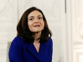 FILE - IN this Jan. 22, 2018 file photo, Operating Officer of Facebook, Sheryl Sandberg attends a meeting with France's President Emmanuel Macron, during the "Choose France" summit, at the Chateau de Versailles, outside Paris.  Sandberg says Facebook should have conducted an audit after learning that a political consultancy's improperly accessed user data nearly three years ago. The company's chief operating officer told NBC's Today show, Friday, April 6,  that Facebook is now undertaking that audit. Sandberg said that at the time, Facebook received legal assurances that Cambridge Analytica had deleted the improperly obtained information.
