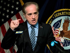 FILE - In this March 7, 2018, file photo, Veterans Affairs Secretary David Shulkin speaks at a news conference at the Washington Veterans Affairs Medical Center in Washington. Shulkin is making it clear he was fired from his job amid conflicting claims from the White House.