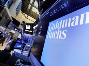 FILE - In this Dec. 13, 2016, file photo, the logo for Goldman Sachs appears above a trading post on the floor of the New York Stock Exchange. The Goldman Sachs Group Inc. The Goldman Sachs Group Inc.