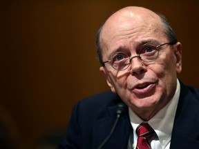 FILE- In this Feb. 14, 2018, file photo, Internal Revenue Service Acting Commissioner David Kautter testifies before the Senate Finance Committee on Capitol Hill in Washington on President Donald Trump's fiscal year 2019 budget proposal. Kautter says the current tax-filing season has gone well, while acknowledging the tough challenge the cash-strapped agency faces of administering the new tax law that will affect 2019 returns. Kautter told the Senate Finance Committee on Thursday, April 12, that the new law "will require extensive work" by the IRS.