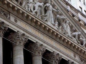 FILE- This April 5, 2018, file photo shows the facade of the New York Stock Exchange. The U.S. stock market opens at 9:30 a.m. EDT on Tuesday, April 25.