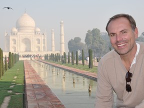 This undated photo shows John DiScala, better known as the air travel expert Johnny Jet, at the Taj Mahal in Agra, India. DiScala offered tips and strategies for booking flights and getting the best deals for summer travel in an interview with the AP Travel podcast "Get Outta Here!" airing Wednesday, April 25.
