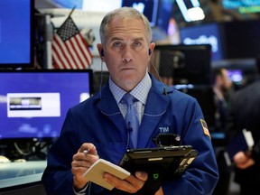 Trader Timothy Nick works on the floor of the New York Stock Exchange, Thursday, April 19, 2018. U.S. stocks moved lower in morning trading Thursday, weighed down by losses in technology companies and makers of consumer products.