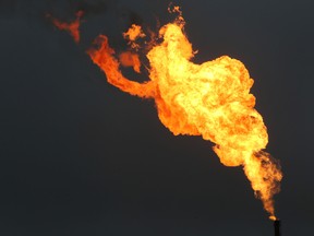 Flames from a gas flare burn at an oil flow station in Nigeria.