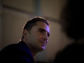 FILE - In this Jan. 28, 2016 file photo, former HSBC employee Herve Falciani pauses during a press conference in Barcelona, Spain.  A former HSBC technology employee convicted for leaking account data that led to a tax evasion scandal has been arrested in Madrid on an arrest warrant issued by Switzerland, Spanish police said Thursday, April 5, 2018.