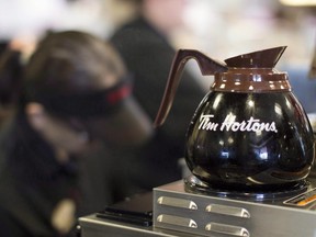 Freshly-brewed coffee sits on a hot plate in a Tim Hortons outlet in Oakville, Ont.