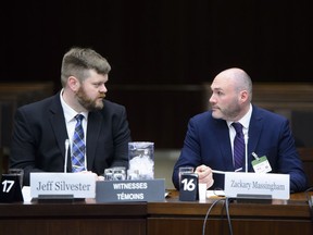 Jeff Silvester, left, and Zackary Massingham of AggregateIQ appear as witnesses at the commons privacy and ethics committee in Ottawa on Tuesday, April 24, 2018. The committee is looking into the breach of personal information involving Cambridge Analytica and Facebook.