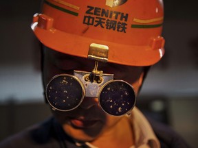 A worker in the furnace control room at the Zhong Tian (Zenith) Steel Group Corporation in Changzhou, Jiangsu.  China now controls 50 per cent of the world’s production.