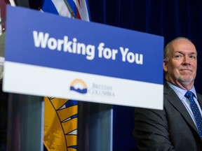 British Columbia Premier John Horgan listens during a housing announcement in Coquitlam, B.C., on Friday April 13, 2018.