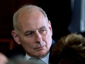 In this April 3, 2018 photo, President Donald Trump's Chief of Staff John Kelly attends a news conference in the East Room of the White House in Washington.  Kelly, once empowered to bring order to a turbulent West Wing, is receding from view, his clout diminished, his word less trusted by staff and his guidance less tolerated by an increasingly go-it-alone-president. Emboldened in his job, President Donald Trump has rebelled against Kelly's restrictions and mused about doing away with the chief of staff post entirely, leaving White House staffers and Trump allies to believe that Kelly is working on borrowed time.