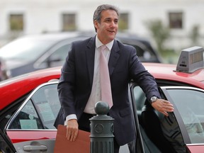 FILE - In this Sept. 19, 2017, file photo, Michael Cohen, President Donald Trump's personal attorney, arrives on Capitol Hill in Washington. For more than a decade, Cohen has served as Trump's private attorney and image protector. Now the FBI raids on Cohen's office and hotel room to seize records on that payment and others has cast a spotlight on the influential figure widely considered Trump's fixer.