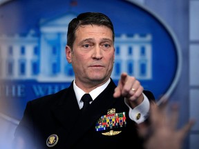 FILE - In this Jan. 16, 2018, file photo, White House physician Dr. Ronny Jackson speaks to reporters during the daily press briefing in the Brady press briefing room at the White House, in Washington. Jackson, President Donald Trump's pick to lead Veterans Affairs withdrew April 26, in the wake of late-surfacing allegations about overprescribing drugs and poor leadership while serving as a top White House doctor, saying the "false allegations" against him have become a distraction.