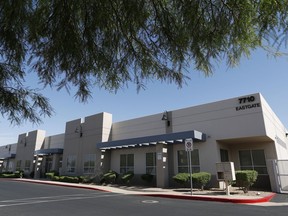 Records obtained by The Associated Press show that a company controlled by Semyon "Sam" Shtayner, a taxi magnate and longtime business associate of President Donald Trump's personal lawyer, has applied for a business license to run a legal medical marijuana cultivation and edible production facility out of this building, photographer April 25, 2018, in Henderson, Nev. Another, unrelated marijuana cultivation business is also located in the same building. Property records show Michael Cohen, whose personal business dealings are being investigated by federal authorities, and his father-in-law, have lent $26 million to Shtayner in recent years.