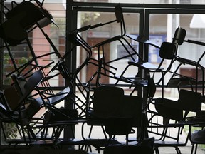 Desks barricade a door at a makeshift hospital inside the Polytechnic University of Nicaragua, UPOLI, in Managua, Nicaragua, Sunday, April 22, 2018. Demonstrators and students have barricaded themselves inside the university campus for several days with police and pro-government supporters laying siege, as protests and disturbances sparked by government social security reforms continued into Sunday. Human rights groups say at least 26 people have been killed in several days of clashes.