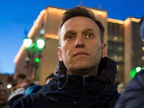 FILE In this file photo taken on Tuesday, March 27, 2018, Russian opposition leader Alexei Navalny attends a rally to commemorate the victims of Sunday's fire in a shopping mall in the Siberian city of Kemerovo, in the center of Moscow, Russia. Russia's Supreme Court on Wednesday, April 25, 2018 upheld a criminal conviction of opposition leader Alexei Navalny and his brother, which was the formal reason barring him from running in the March presidential election.