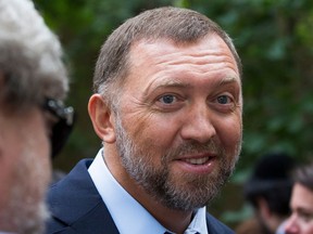 FILE- In this file photo taken on Thursday, July 2, 2015, Russian metals magnate Oleg Deripaska attends Independence Day celebrations at Spaso House, the residence of the American Ambassador, in Moscow, Russia.  Sanctions announced Friday April 6, 2018, are targeting 17 Russian government officials and seven Russian oligarchs, including Deripaska, who is being targeted with more comprehensive U.S. sanctions according to officials.