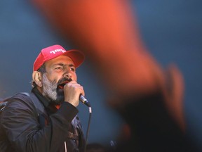 Armenian protest leader Nikol Pashinian delivers his speech during a rally in Yerevan, Armenia, Sunday, April 29, 2018. The leader of the wave of protests that has pushed Armenia into a political crisis says he has met with the country's president. Pashinian said Sunday that he hopes President Armen Sarkisian will support Pashinian's bid to become prime minister. The parliament is to choose a new premier on Tuesday, following the resignation last week of Serzh Sargsyan.