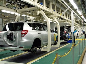 Toyota RAV4s move down the assembly line in Woodstock, Ontario.