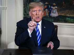 U.S. President Donald Trump said the U.S. will withdraw from the landmark 2015 accord to curb Iran's nuclear program and that he would reinstate financial sanctions on the Islamic Republic, casting the Mideast into a new period of uncertainty.