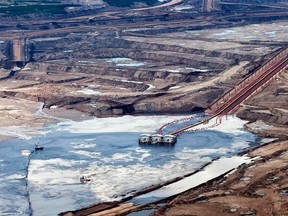 An oilsands facility seen from a helicopter near Fort McMurray, Alberta.