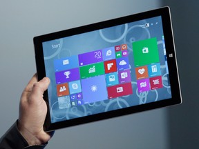 The Microsoft the Surface Pro 3 tablet device is introduced at a media preview in 2014. Microsoft is said to be working on a new line of lower-priced tablets.