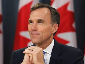 Finance Minister Bill Morneau said on Wednesday that Canada was prepared to cover some losses Kinder Morgan might suffer if Trans Mountain line was delayed and predicted "plenty of investors would be interested" in stepping in.