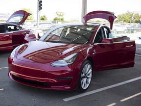 A Tesla Model 3 car.