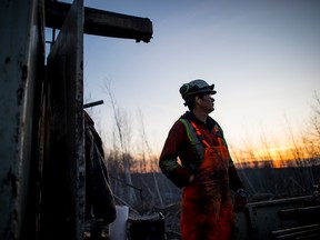 An employee of Forage Asinii Drilling works at one of two drill sites near the small town of Cobalt.