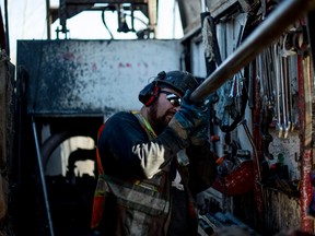 An employee of Forage Asinii Drilling works at one of two drill sites near the small town of Cobalt, Ontario April 26, 2018.