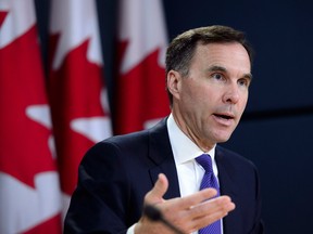 Finance Minister Bill Morneau speaks at the National Press Theatre during a press conference in Ottawa on Tuesday, May 29, 2018.