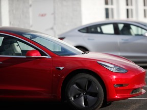 Tesla Model 3s at a dealership in Colorado, U.S. Consumer Reports now recommends the Model 3 after a software update fixed a braking issue.