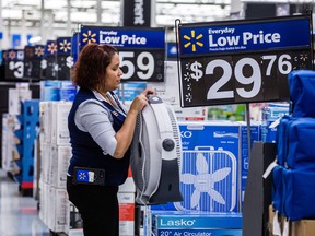 Walmart Canada reported Thursday that same-store sales rose 2.6 per cent in the first quarter as the retailer lowered its food prices to battle the country’s grocery retailers.