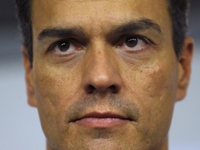 FILE - In this Saturday, Oct. 1, 2016 file photo, Spain's Socialists Party leader Pedro Sanchez pauses as he gives a statement announcing his resignation at the party headquarters in Madrid. Spanish lawmakers face choosing between a "zombie cabinet" and a "Frankenstein government" as they meet Thursday, May 31, 2018 to debate whether to supplant Prime Minister Mariano Rajoy with opposition Socialist leader Pedro Sanchez.